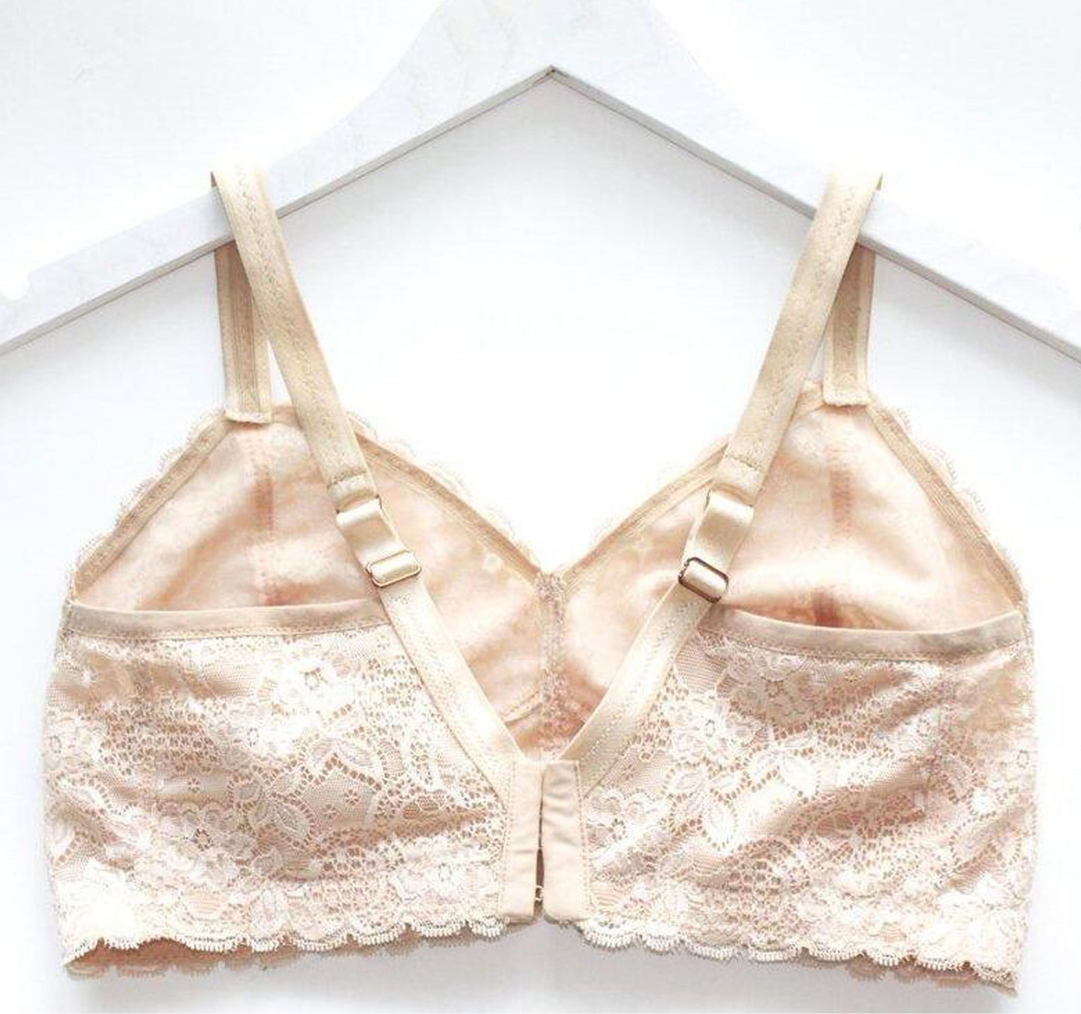 Back view of a custom made wireless bra in beige scalloped lace fabric made to order by Rubies Bras.