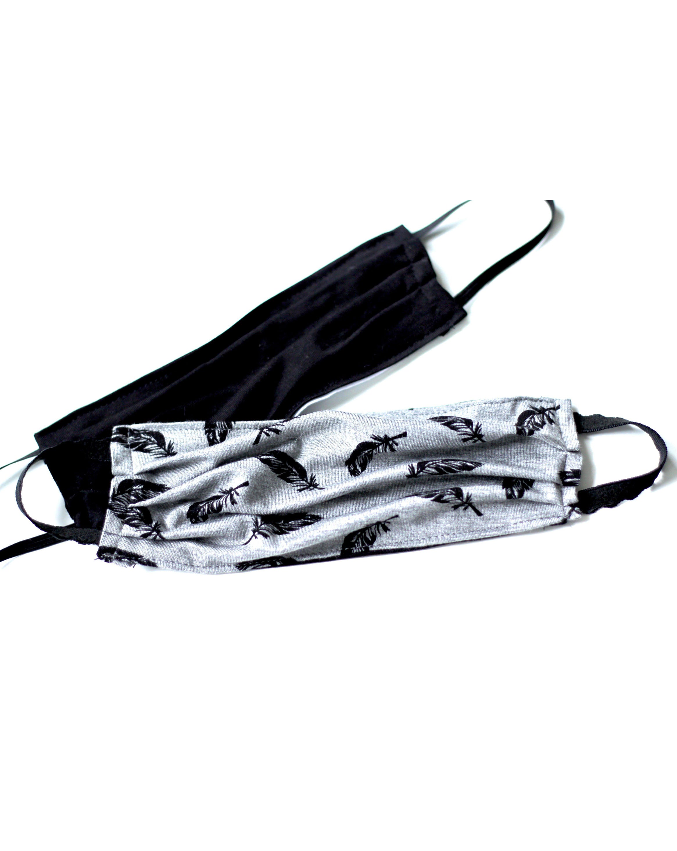 Product photo of black and feather cotton facemask.