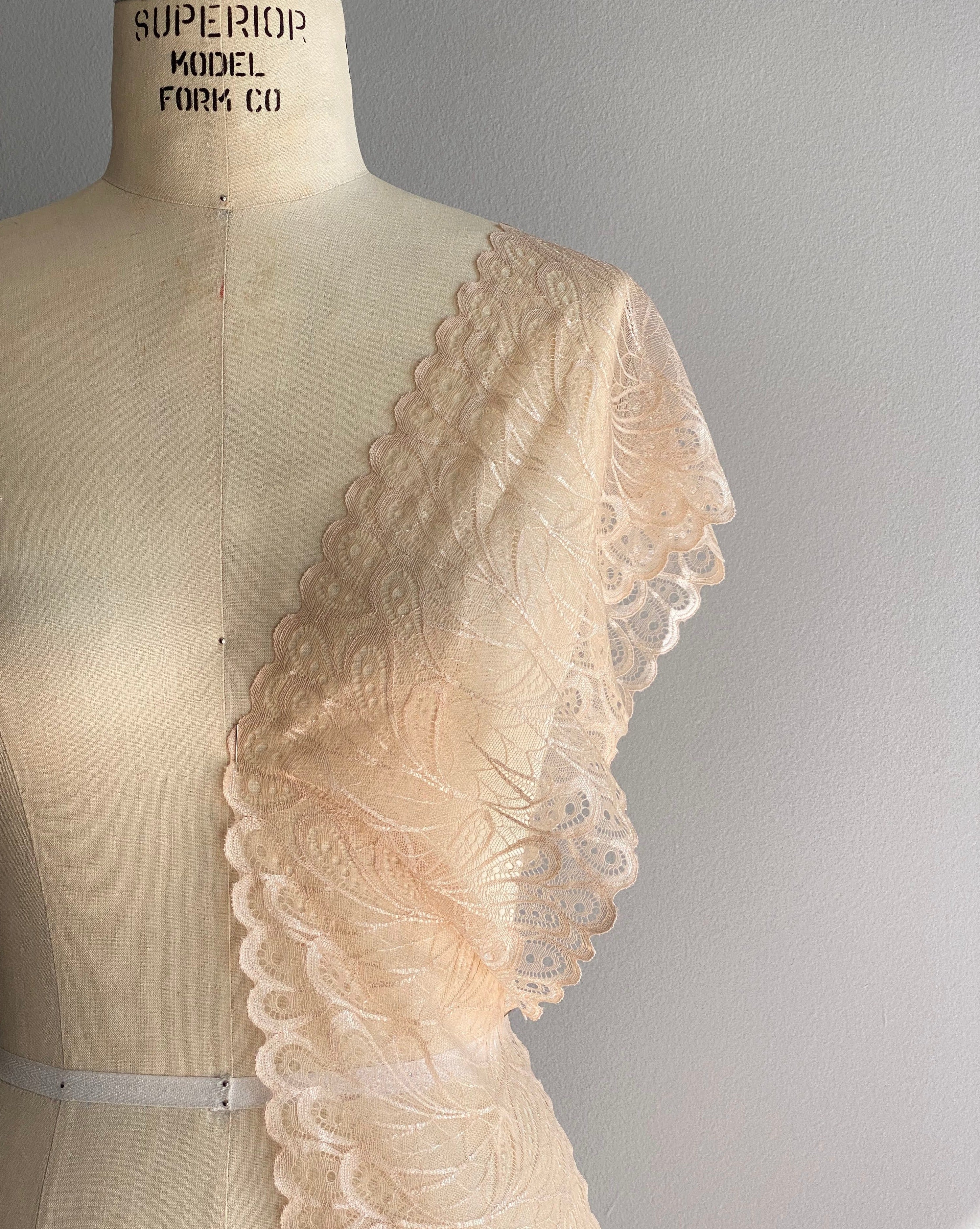 Rubies Custom Bras Soft Beige Peach Lace Sheer Bra Fabric that are used in our custom bras. We use only the softest bra materials that won't itch or cause allergies. Our fabrics are long lasting and high quality. Book a online fitting appointment to have a custom bra made today. A custom bra is worth the price because it is custom made to fit and made to last years.
