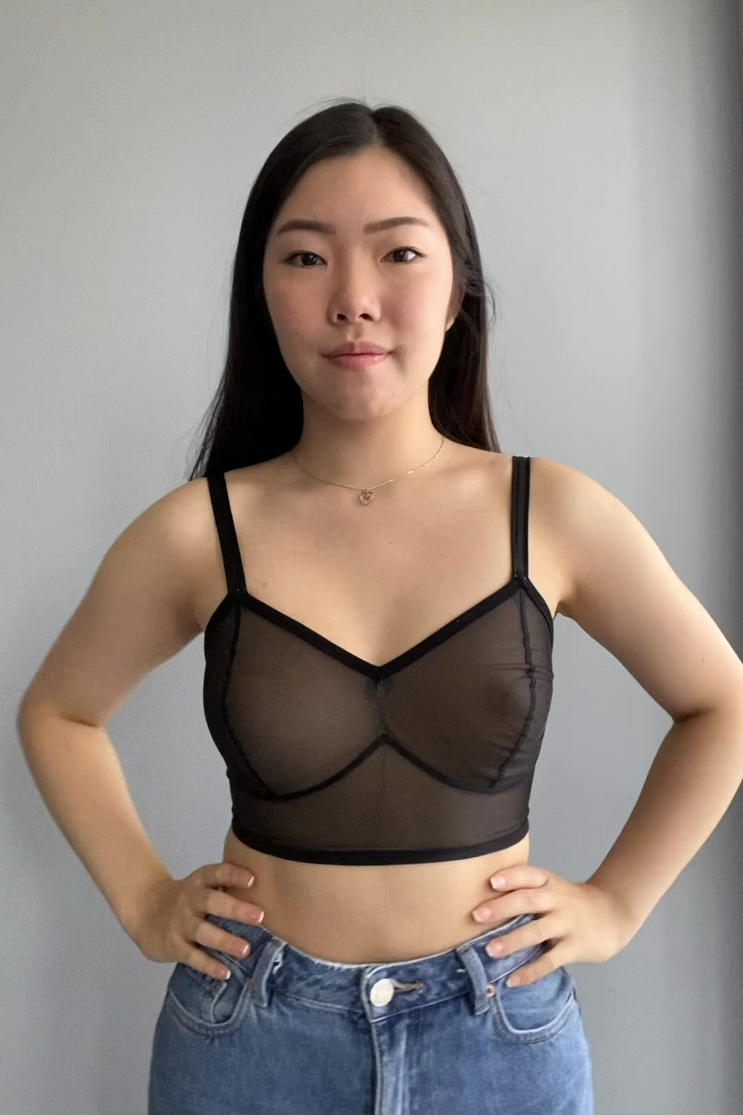 Rubies Bras client and model wearing a black minimal sheer custom made bra