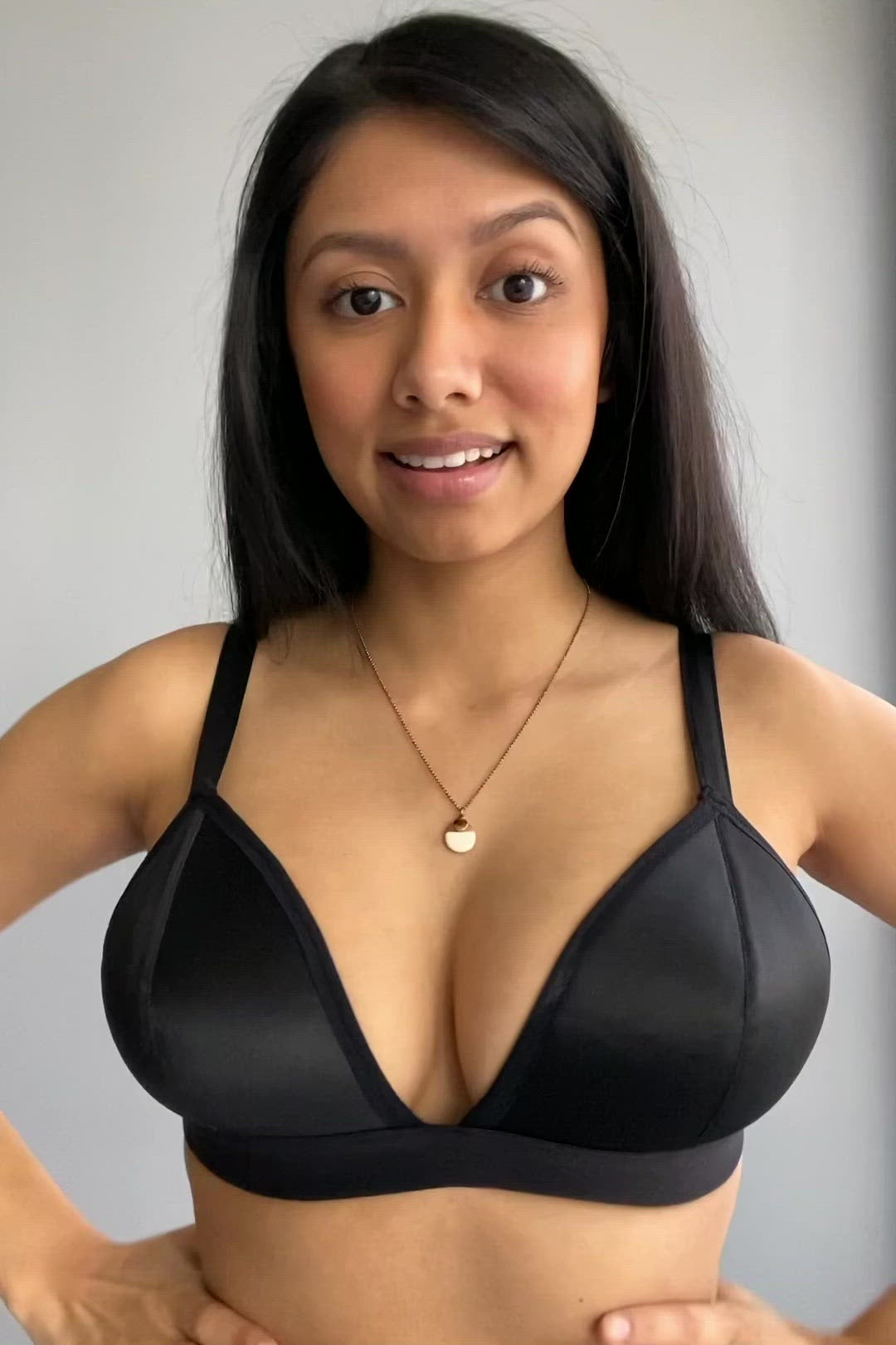 Video of Rubies Bras client and model wearing a black petite solid bra.