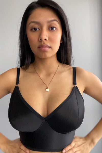 Video of Rubies Bras client and model wearing a black Minimal Solids bra.