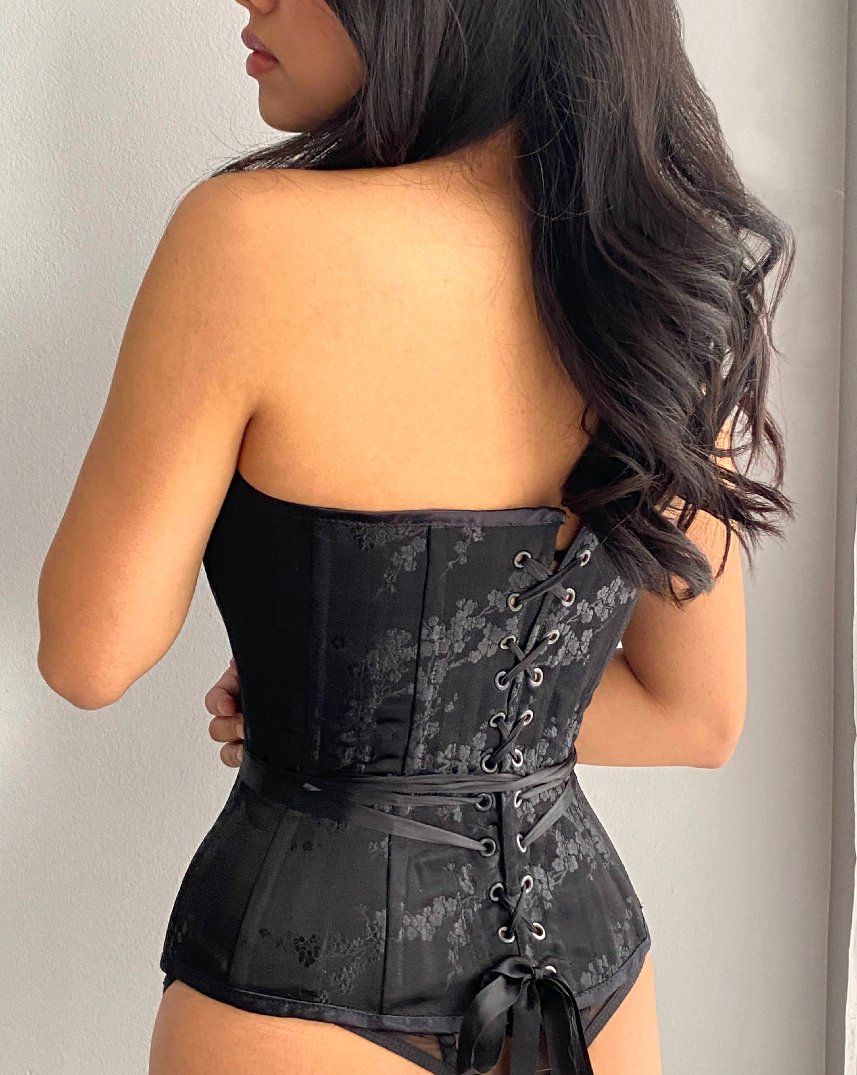 Rubies Bras client and model showing the back of our Corset. 