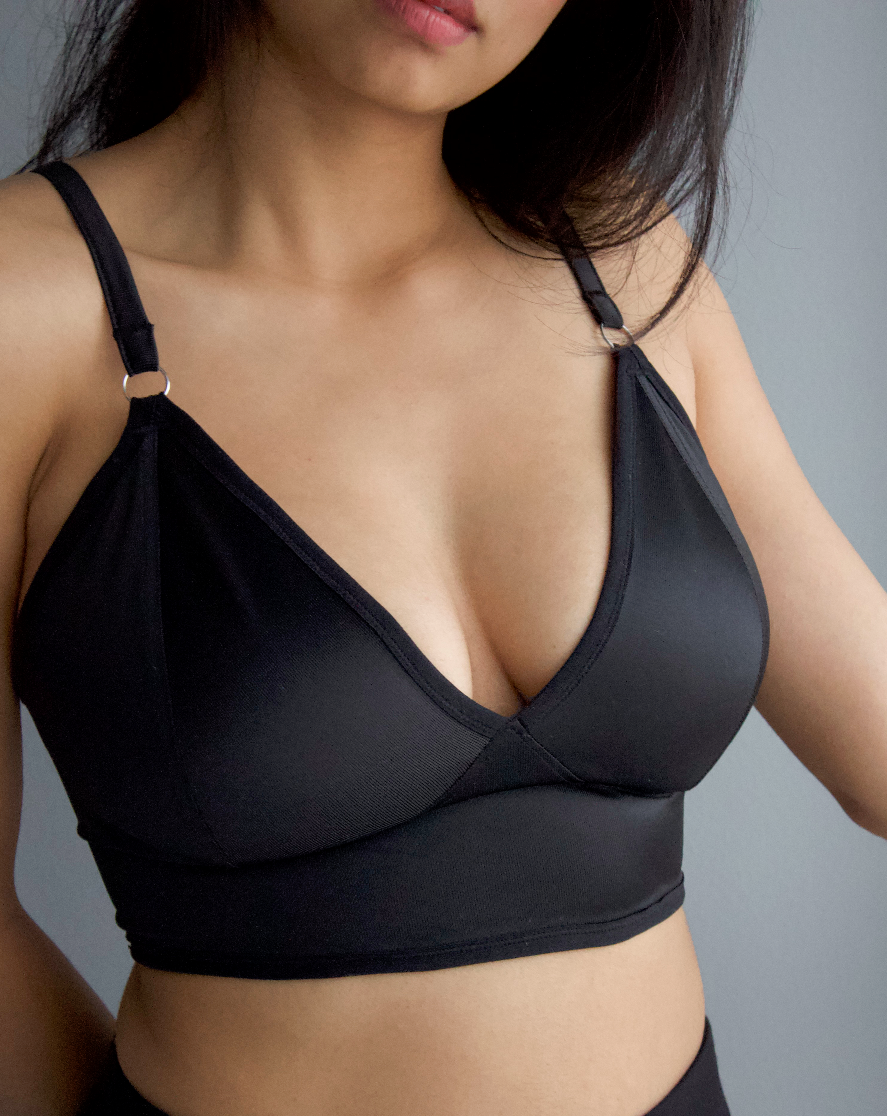 Rubies Bras client and model wearing our Sahaara Solids in stretch satin black. Close up.
