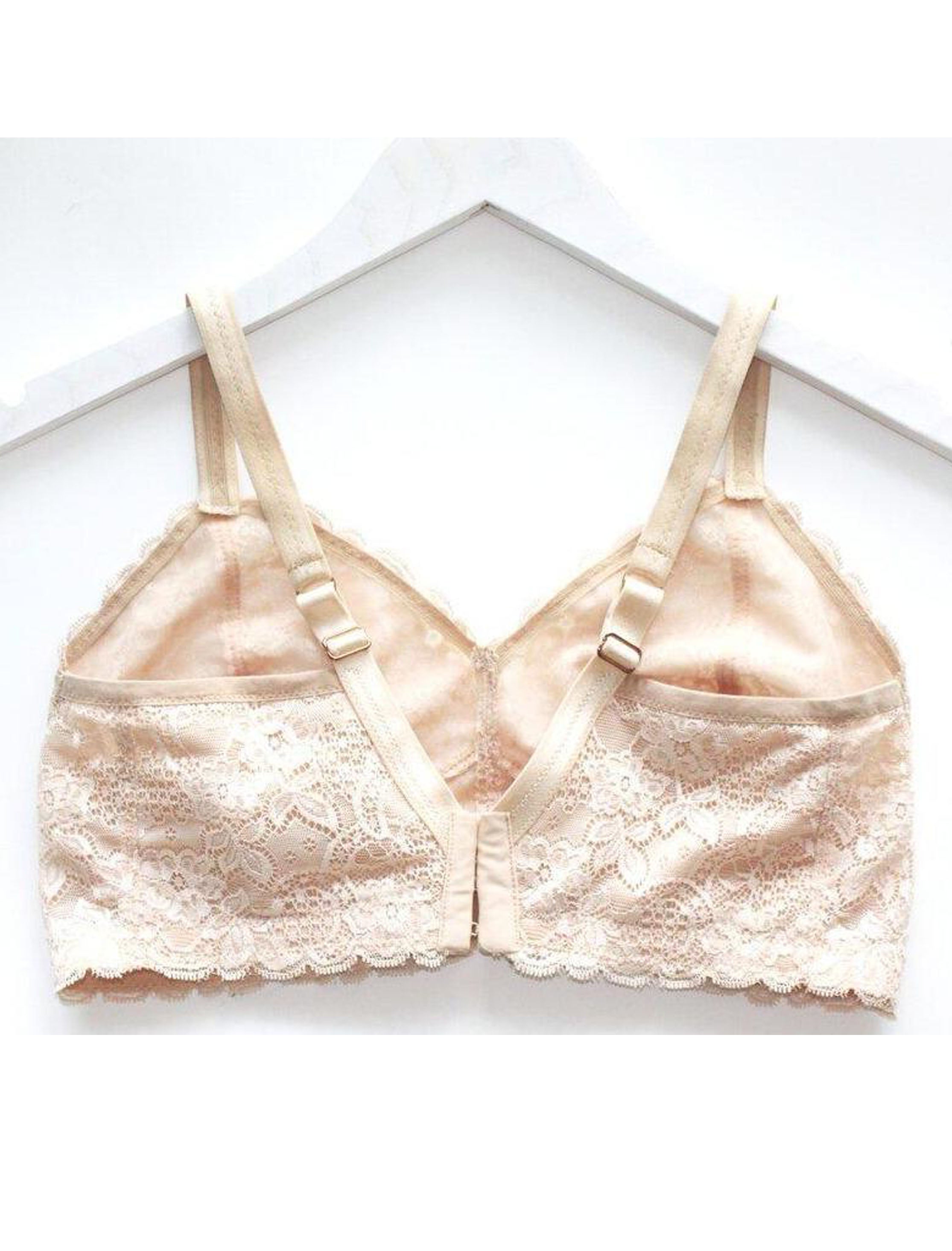 Back view of a custom made wireless bra in beige scalloped lace fabric made to order by Rubies Bras.
