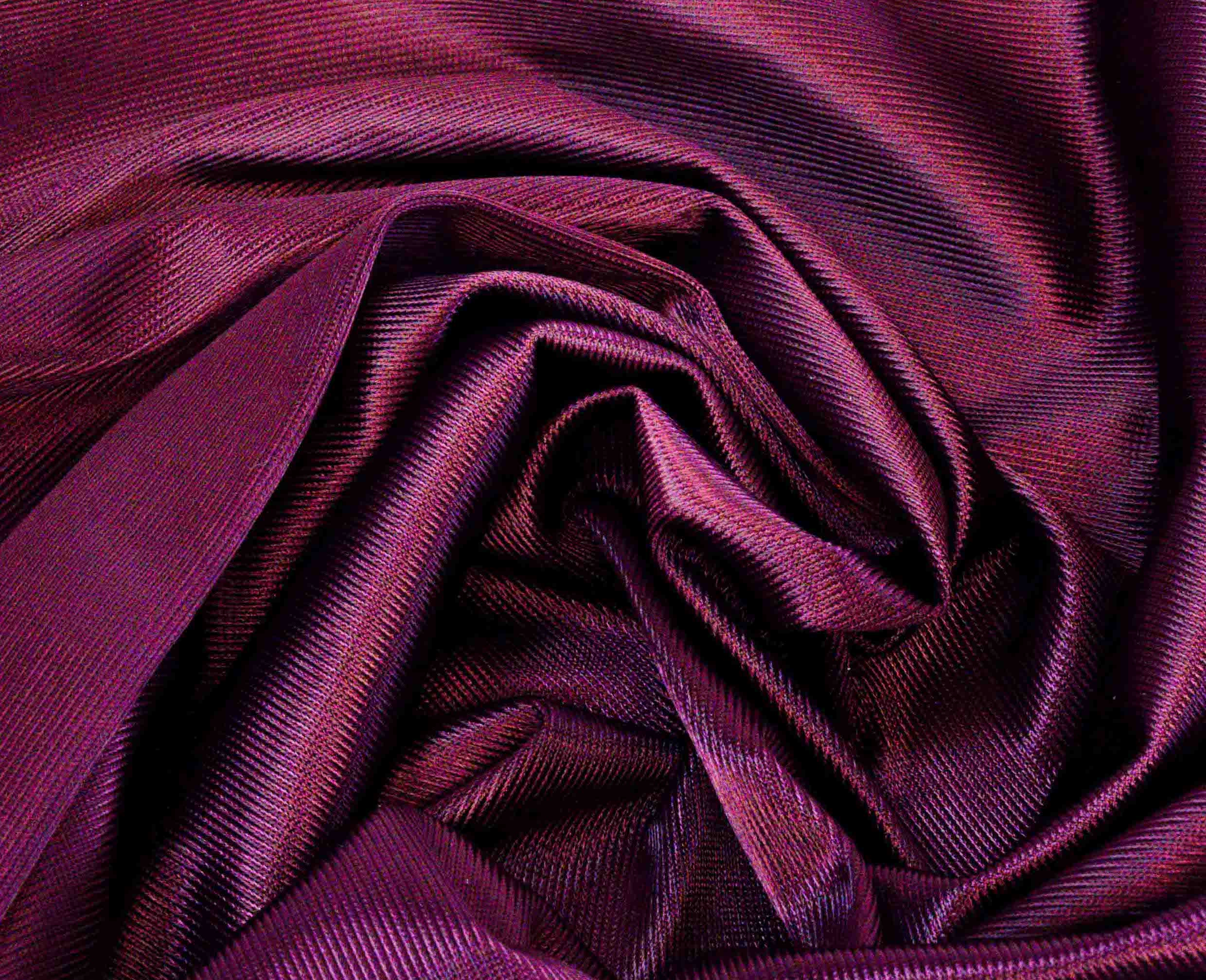 Rubies Bras Stretch Satin fabric in black cherry. Close up.